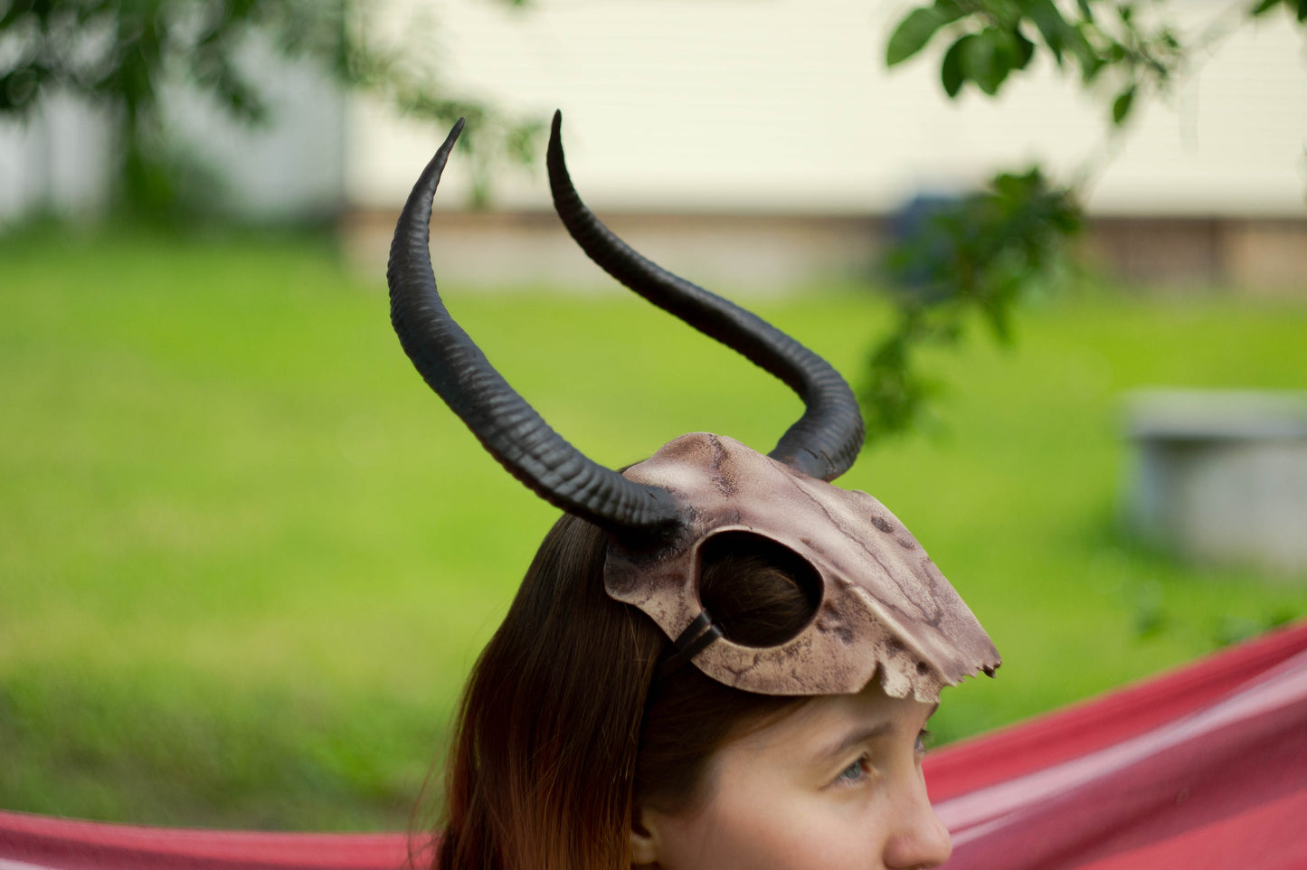 Front view of the Gothic Skull Horned Crown with its hand-painted weathered bone details