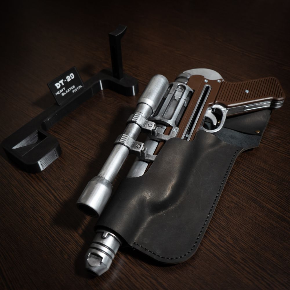 DT-29 Heavy Blaster Pistol replica from Star Wars cosplay prop with detailed hand-painted finish and functional reload mechanism