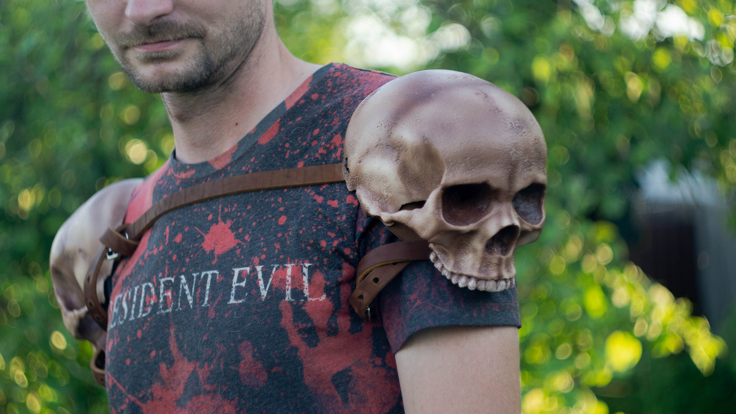 Complete wearable set of twin human skull shoulder armor for dark fantasy