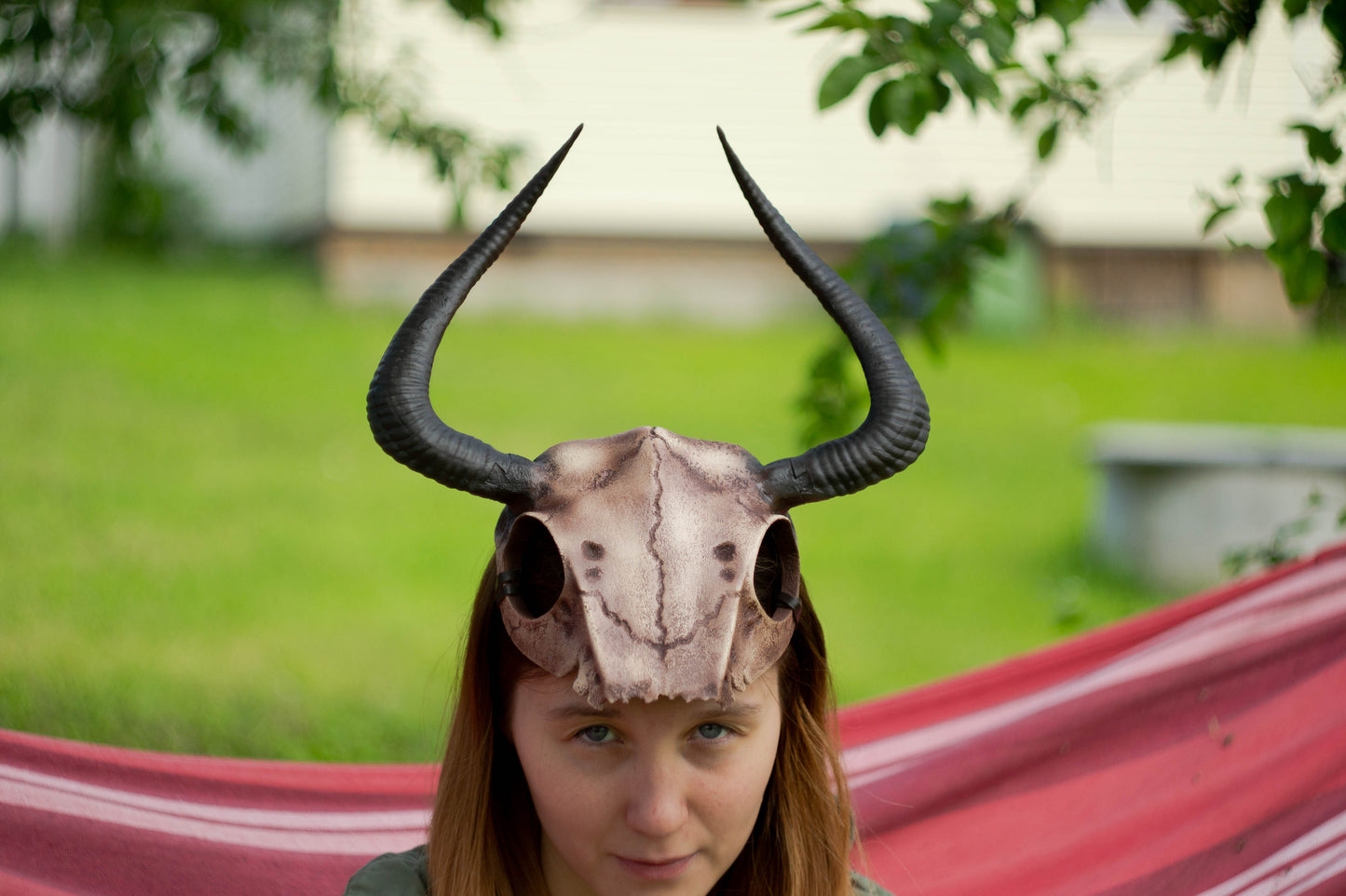 Front view of the Gothic Skull Horned Crown with its hand-painted weathered bone details
