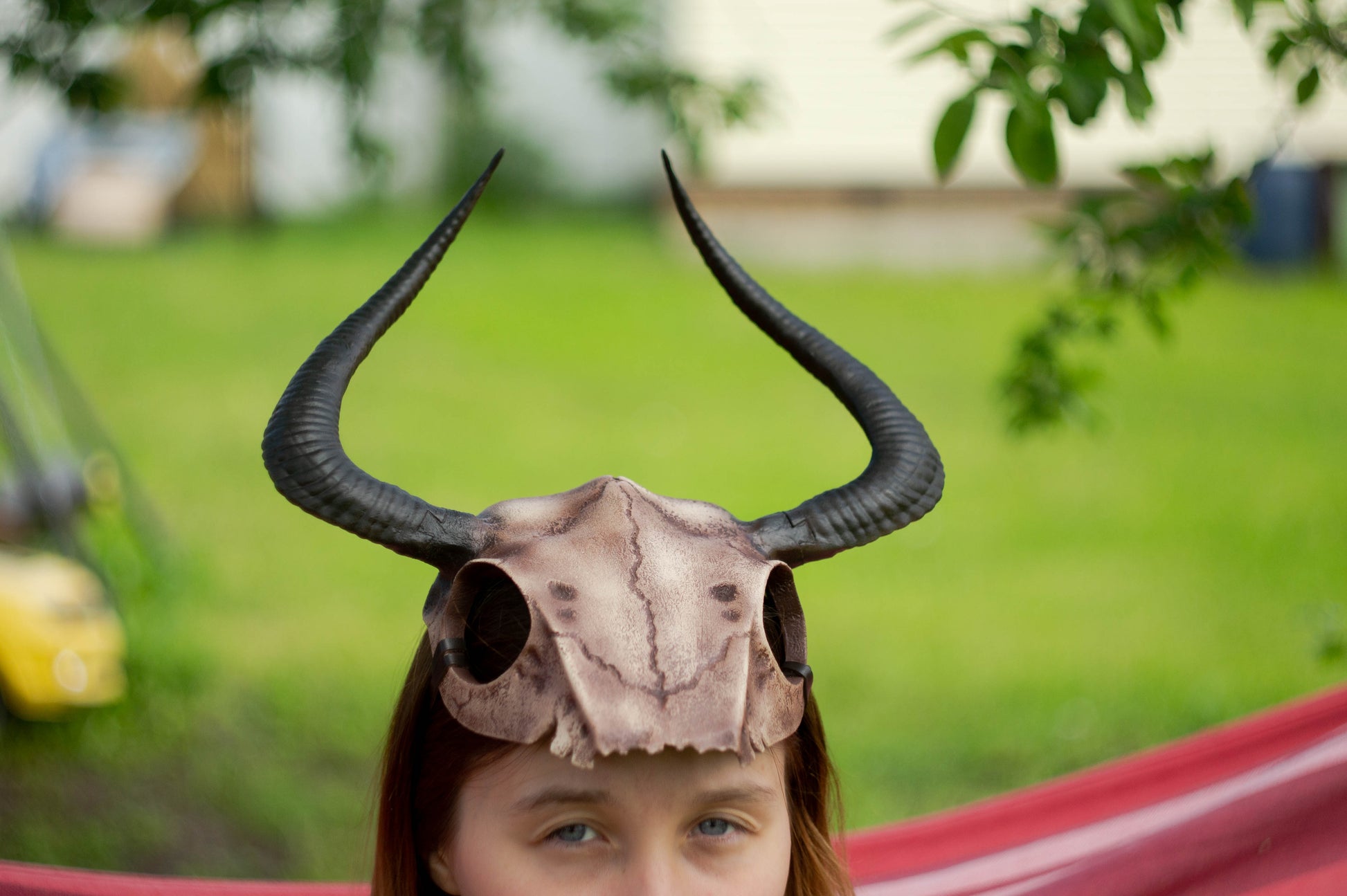 Front view of the Gothic Skull Horned Crown with its hand-painted weathered bone details