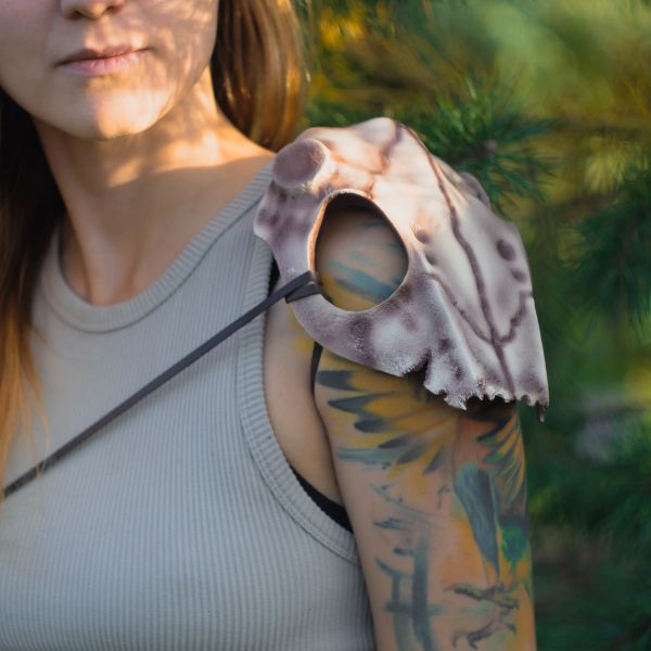Front view of Deer Skull Pauldrons styled on a woodland druid cosplay armor harness.