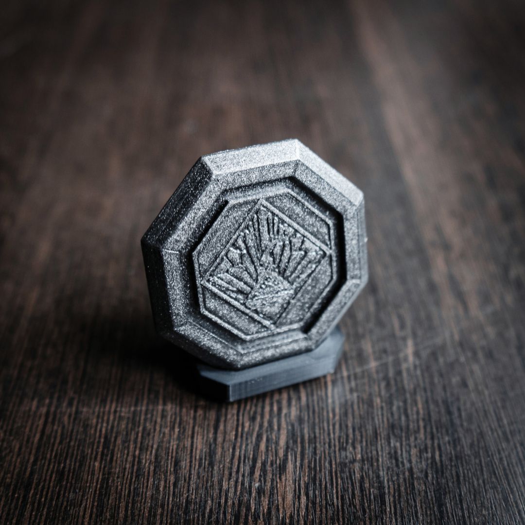 Festival Token replica from Clair Obscur Expedition 33 with display stand