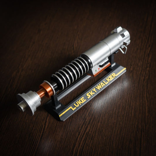 Luke Skywalker lightsaber hilt replica for Star Wars cosplay on display stand