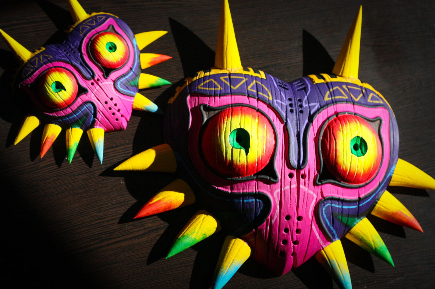 Three sizes comparison of 3D printed Majora's Mask replicas