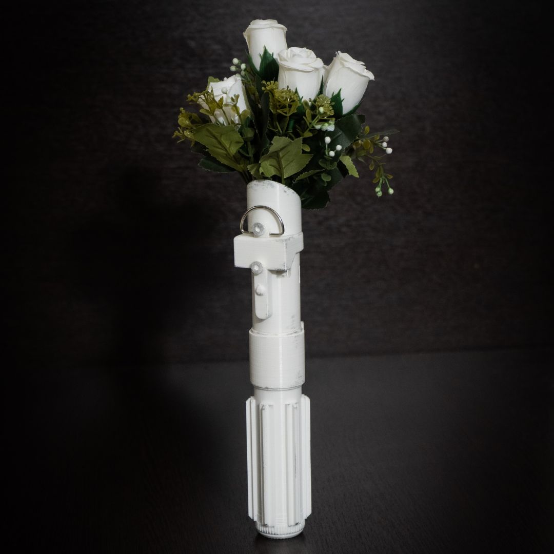 Star Wars wedding bouquet holder in bride hands geek themed wedding ceremony
