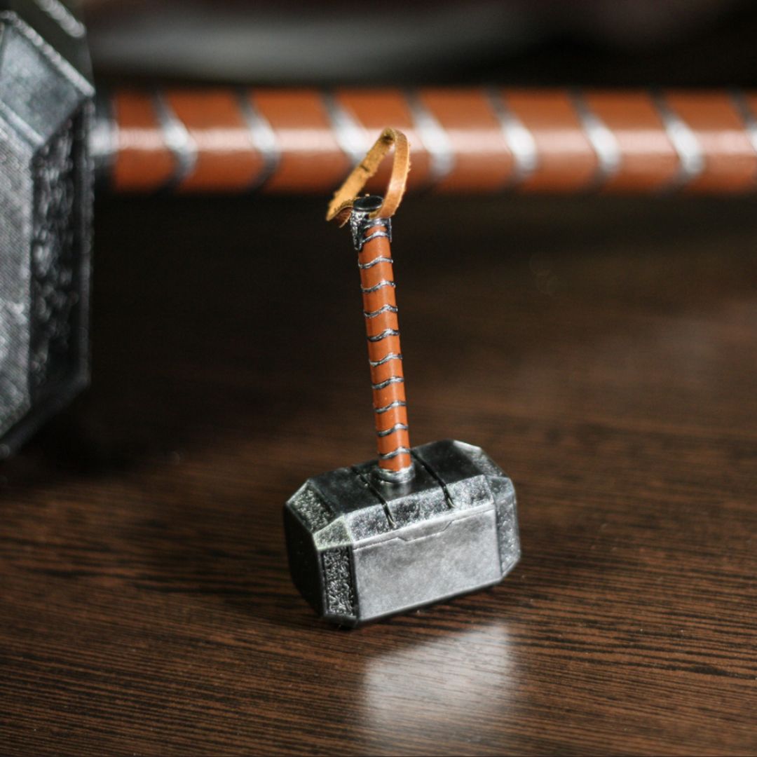 Miniature 1:4 scale Thor hammer replica with detailed resin head and wrapped leather handle