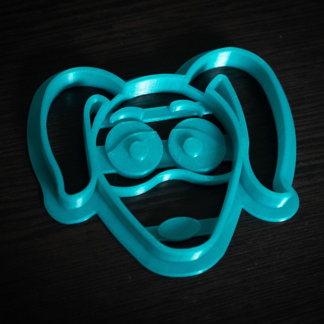 Close-up of Slinky Dog and Mr. Potato Head 4-inch baking molds