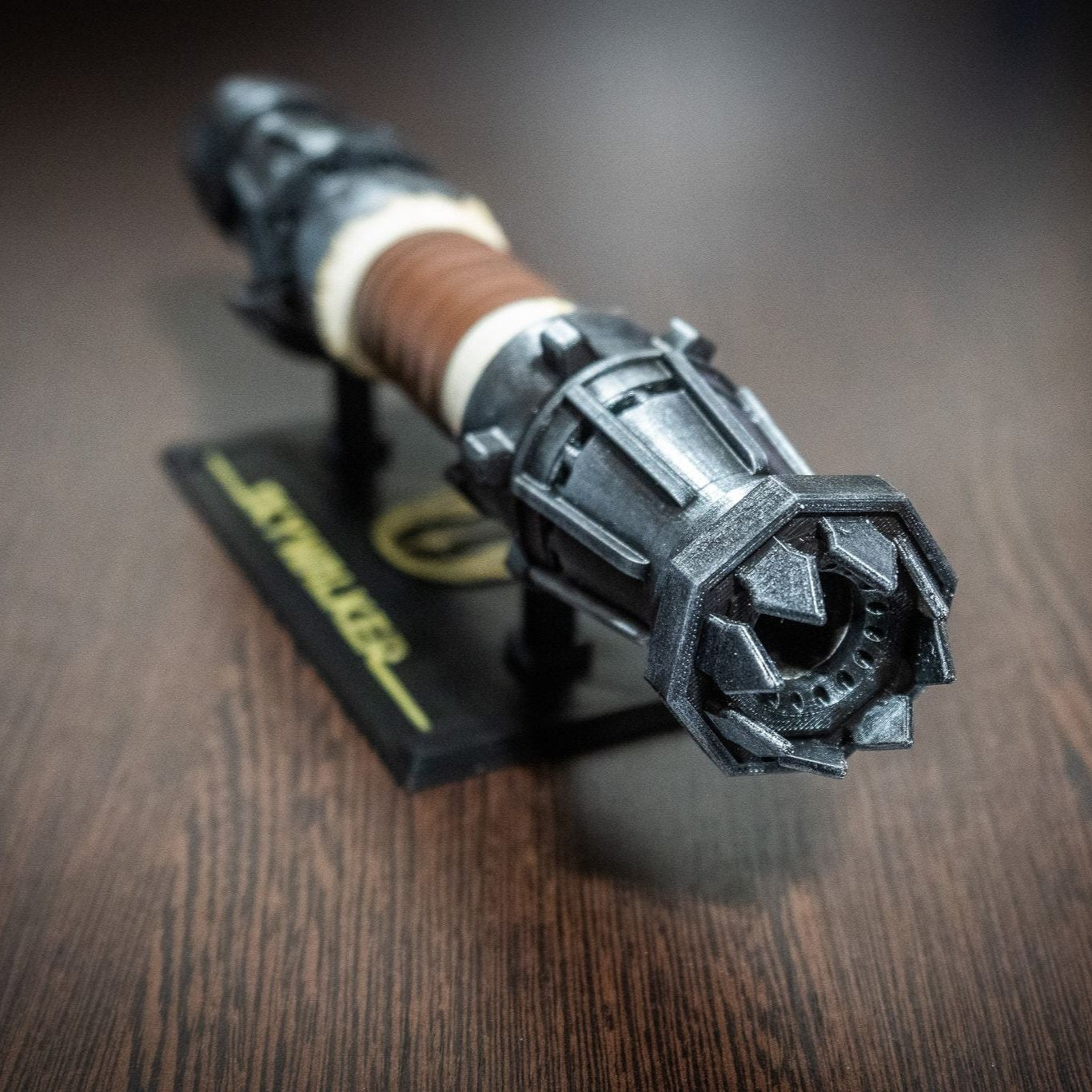 Hand-painted weathered metallic finish on a Star Wars IX cosplay prop