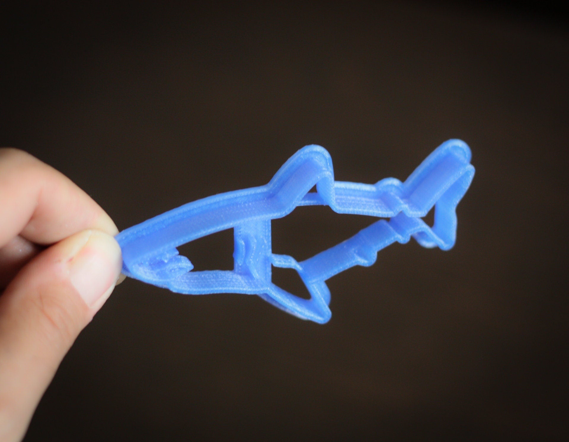 Precision fondant cutter for shark and ocean themed cake decorations