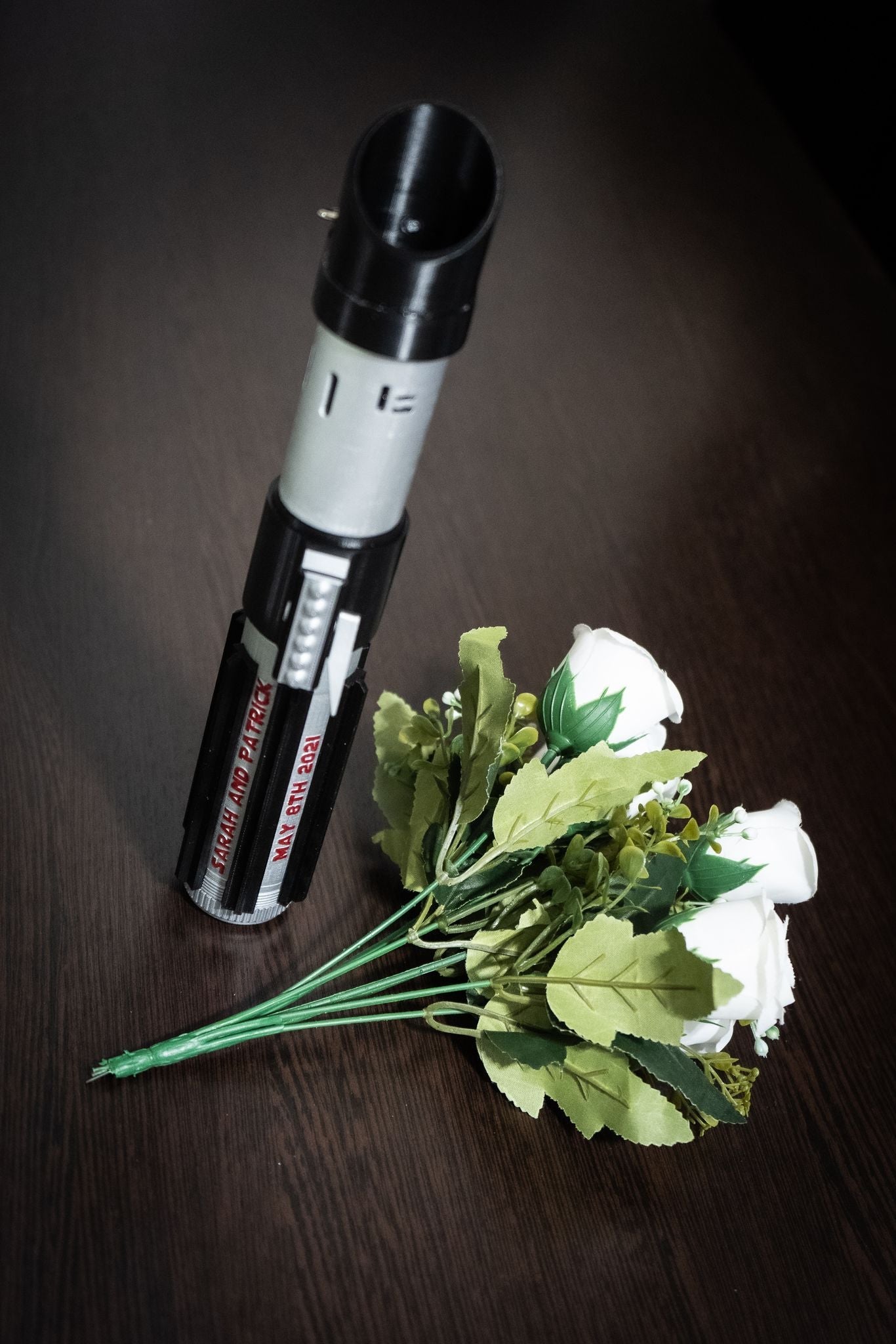 Star Wars themed wedding decor: Lightsaber hilt for bridal flowers